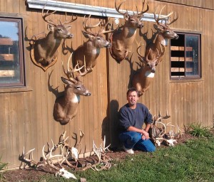 NextBuk Outdoors Pro Staffer Gary Sparks from Ohio with wall of big bucks