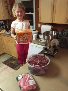 Jordyn Erdody makes homemade venison hot dogs with her dad